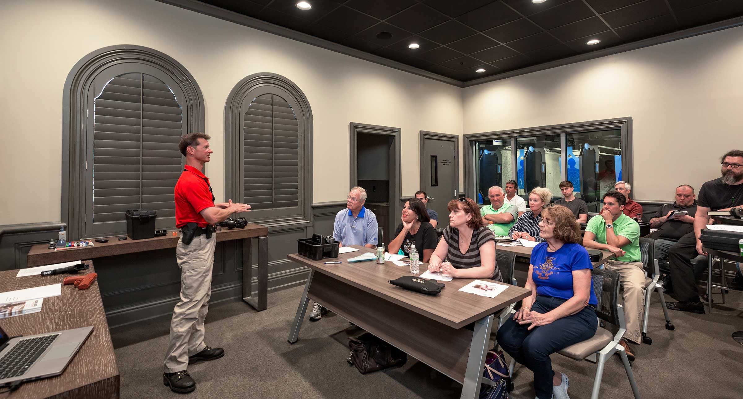 Instructor teaching a firearms training class at The Alamo Range